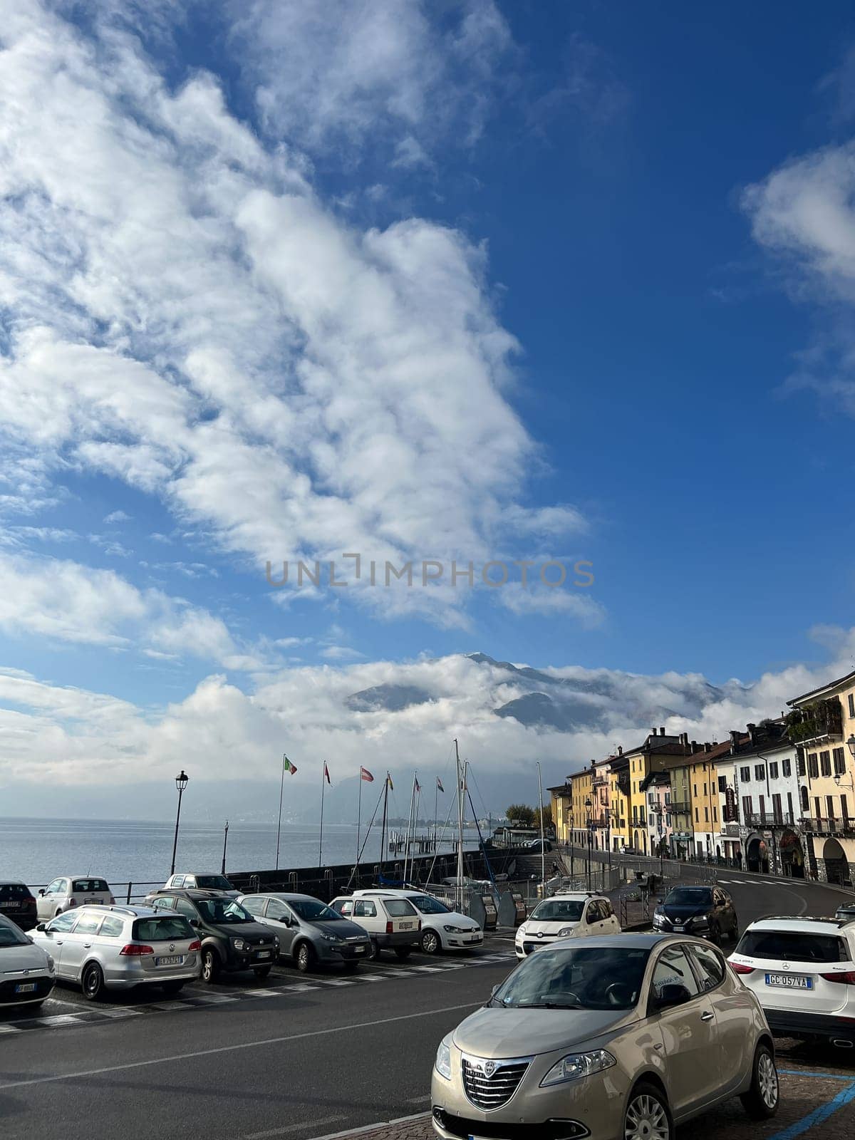 Embankment of the village of Domaso with colorful villas on the shore of Lake Como. Italy. High quality photo