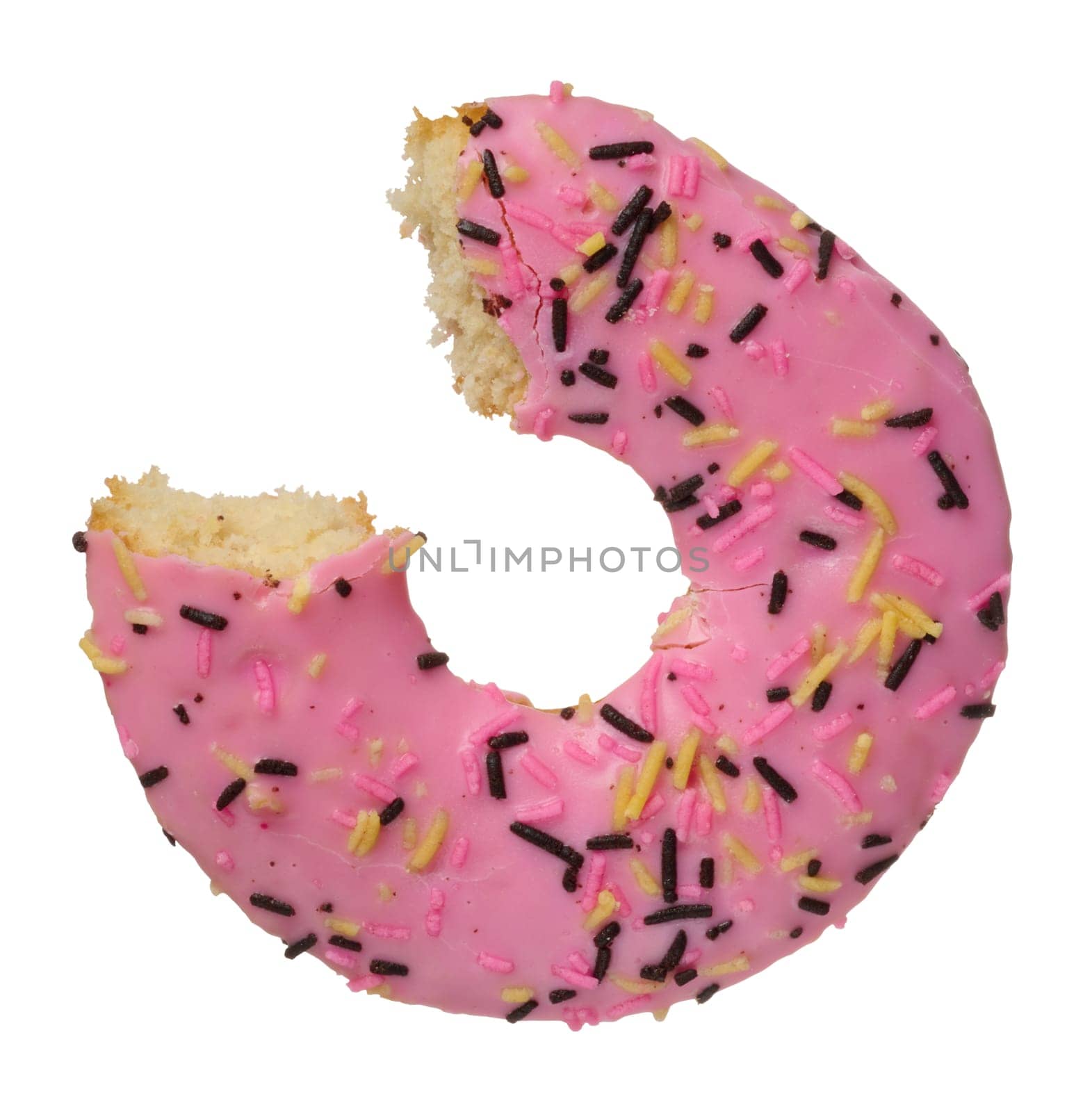 The donut is covered with pink glaze and sprinkled with colorful sprinkles, a piece is taken out. Dessert on isolated background
