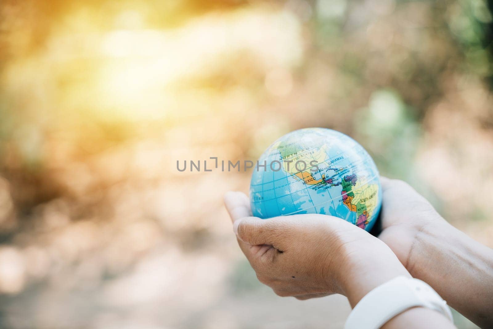 In the spirit of World Earth Day, embrace a green leaf and the globe to represent Green Energy, ESG, and Environmental Responsibility. Signify support and wisdom in caring for our planet.