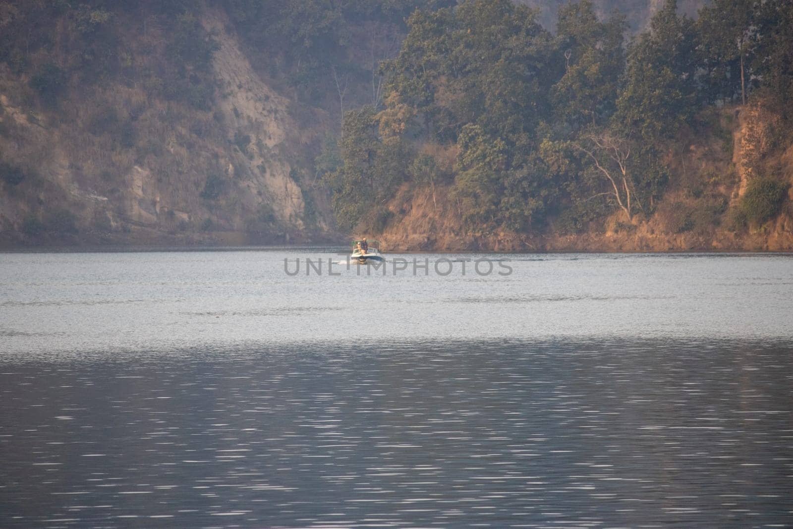 Beauty of water boats gracefully navigating Uttarakhand's rivers.High quality image