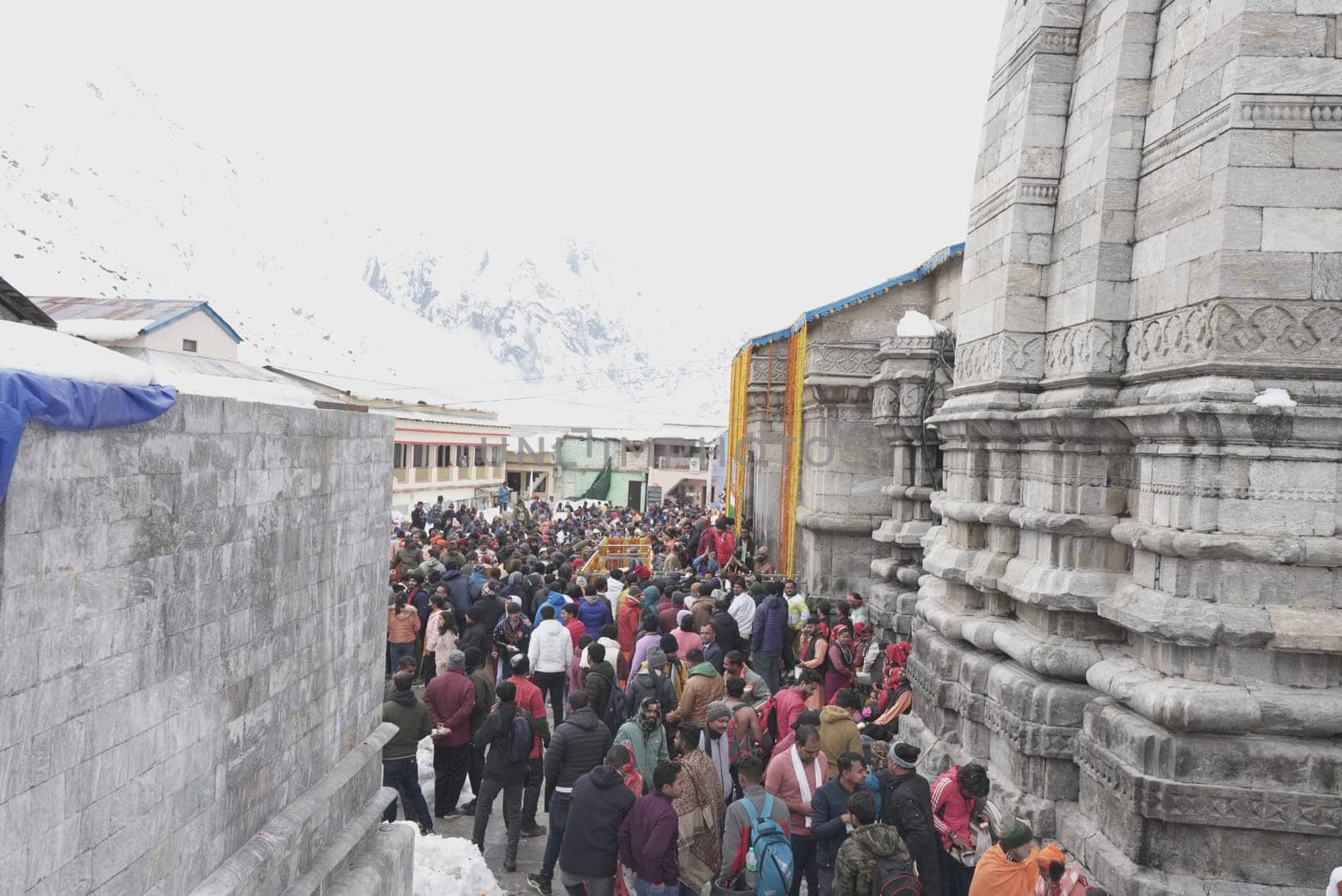 In the shadow of the divine, the crowd at Kedarnath weaves a tapestry of faith and beauty.4k footage