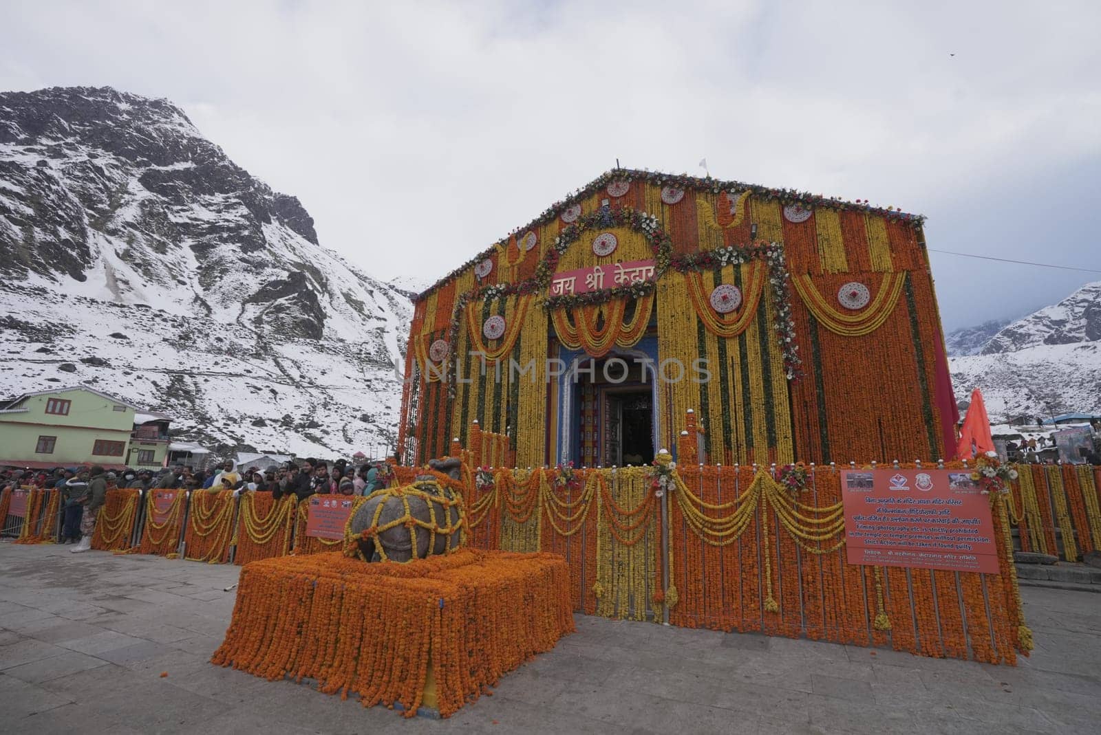 An offering of a beautiful flower garland graces Kedarnath Temple, weaving nature's elegance into sacred worship.4k footage