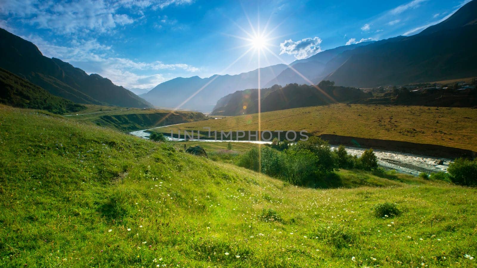 Beautiful view of the mountains illuminated by the sun in summer. Georgia, Europe. Caucasus mountains.