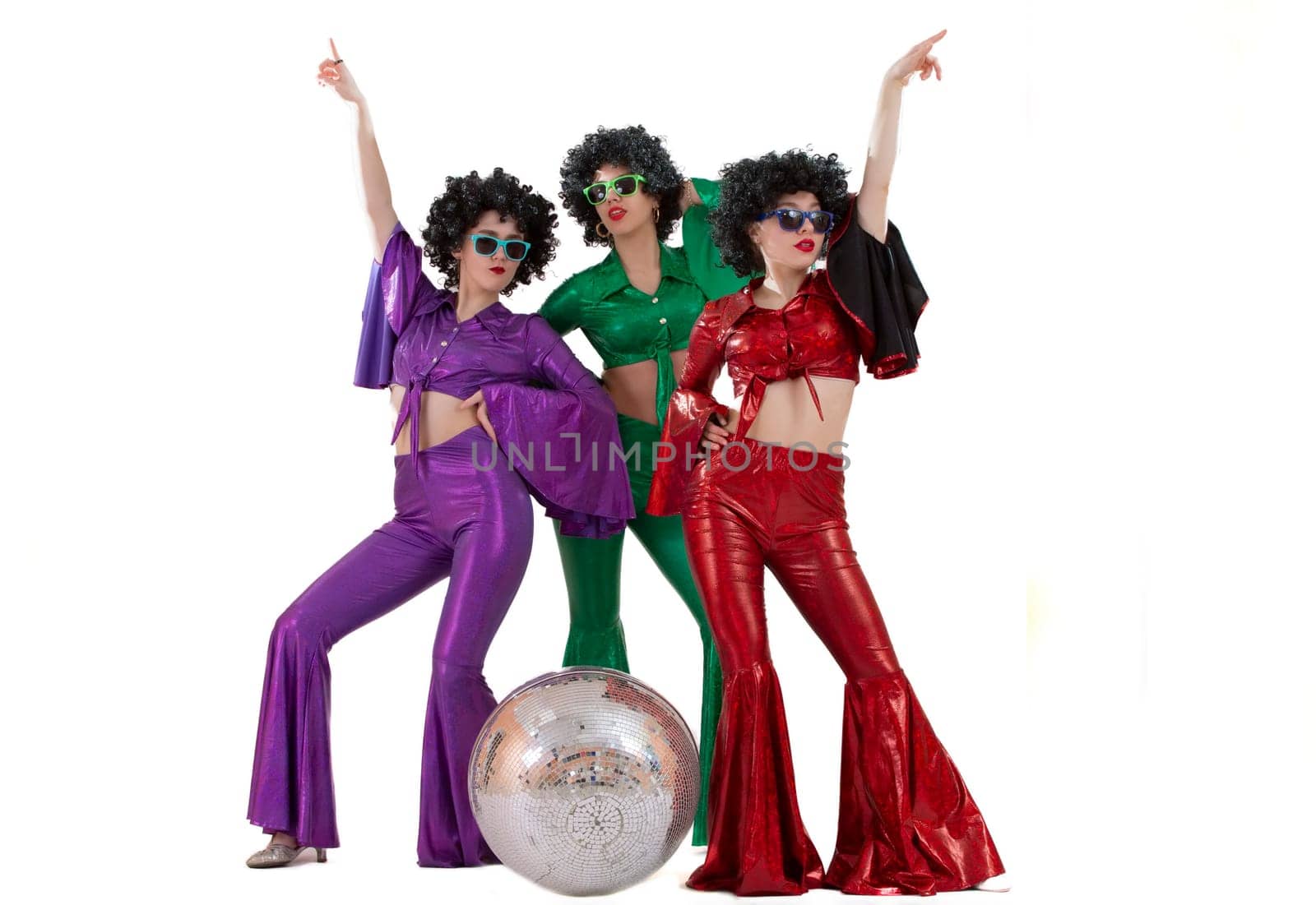 Group of girls amazed in disco style, with disco ball, halloween party, on white background. by Sviatlana