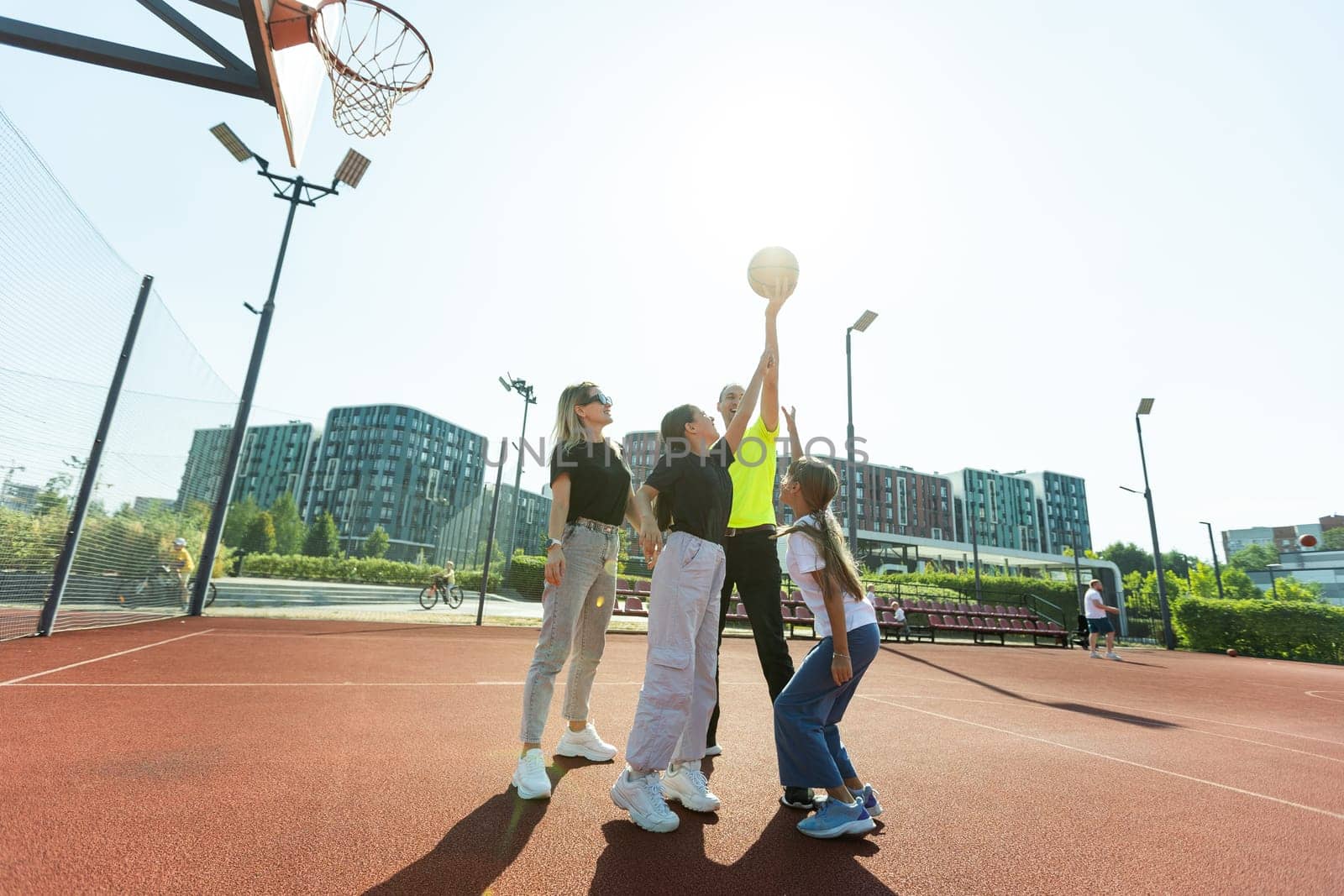 Basketball with family make me happy. High quality photo