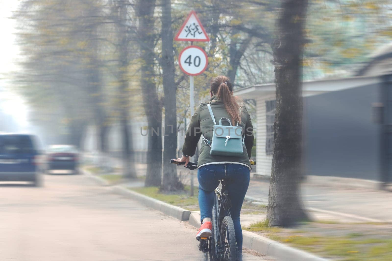 girl on a bicycle rides around the city, eco transport