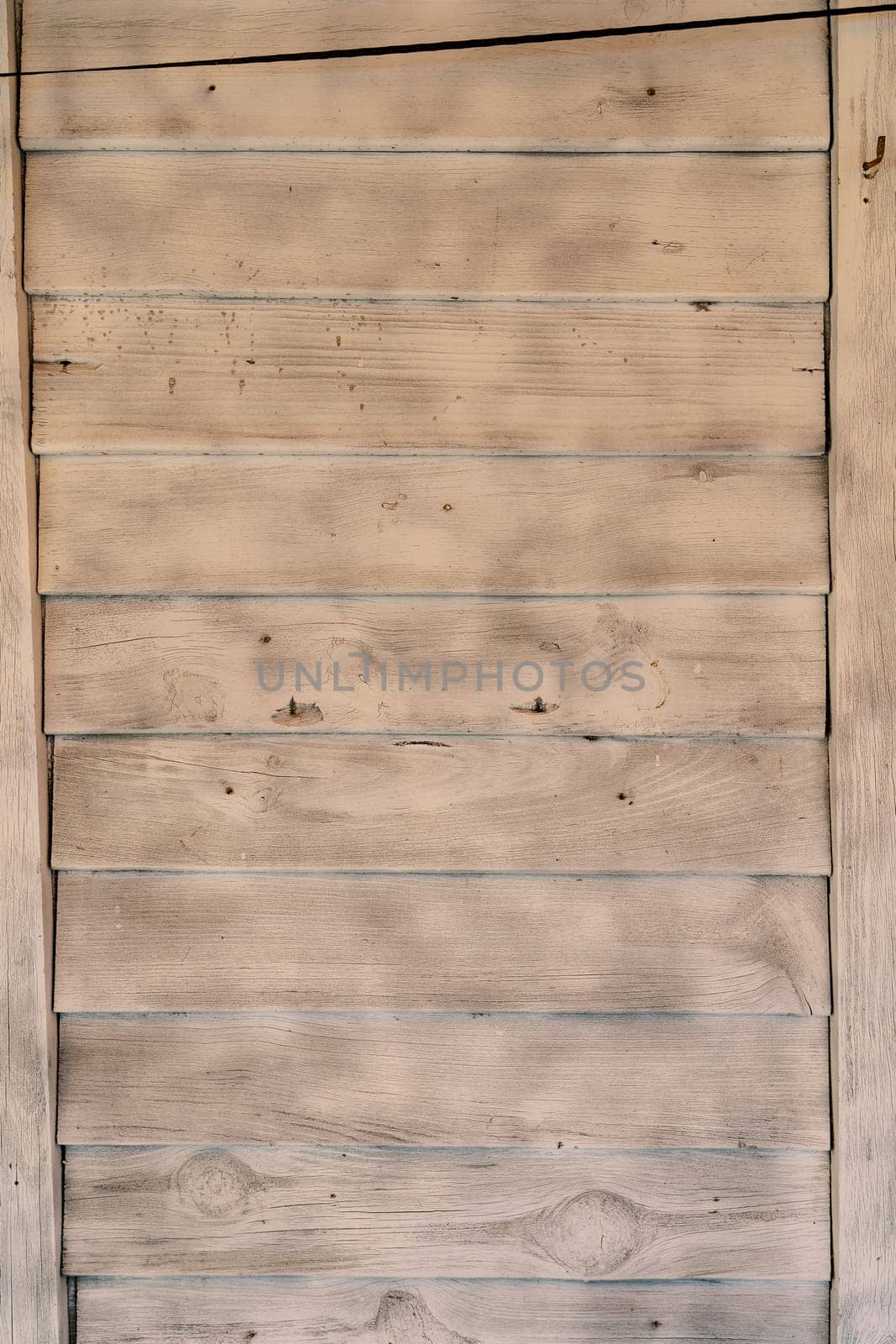 Light wooden horizontal wall planks texture. High quality photo