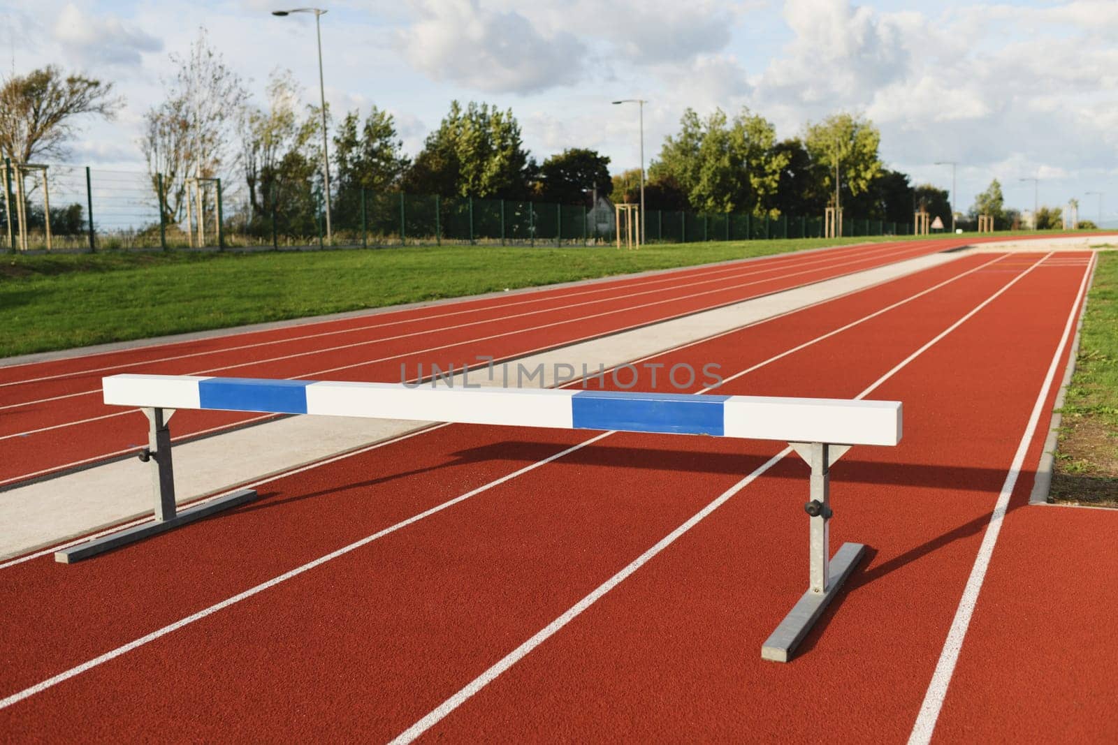 Empty stadium with barrier obstacle by Godi