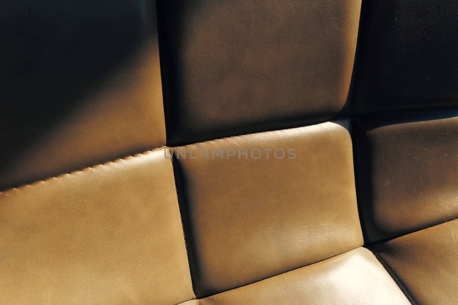 leather furniture upholstery with stitching stitches. High quality photo