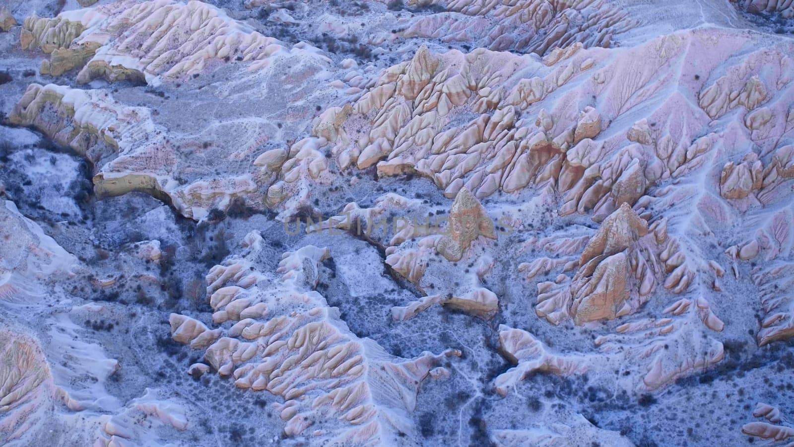 Volcanic rocks of Cappadocia in the winter in Turkey. Aerial view