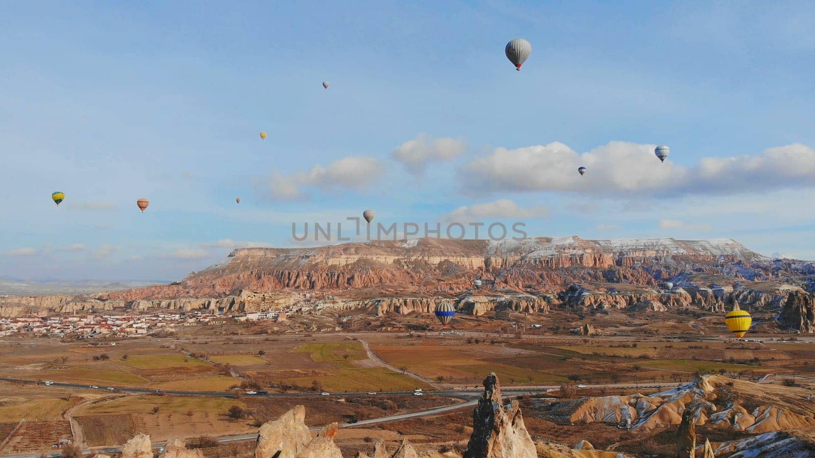 Beautiful Nature of Cappadocia on with balloons on a background of camel rocks. Turkey