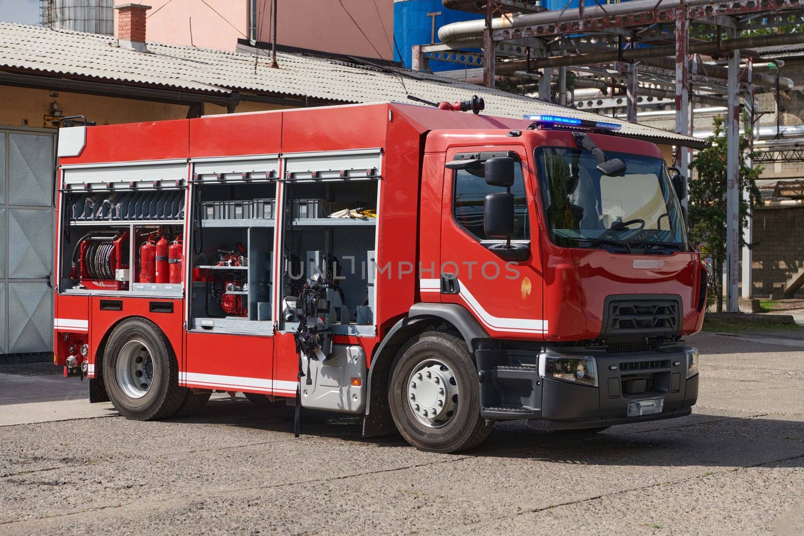 A state-of-the-art firetruck, equipped with advanced rescue technology, stands ready with its skilled firefighting team, prepared to intervene and respond rapidly to emergencies, ensuring the safety and protection of the community by dotshock