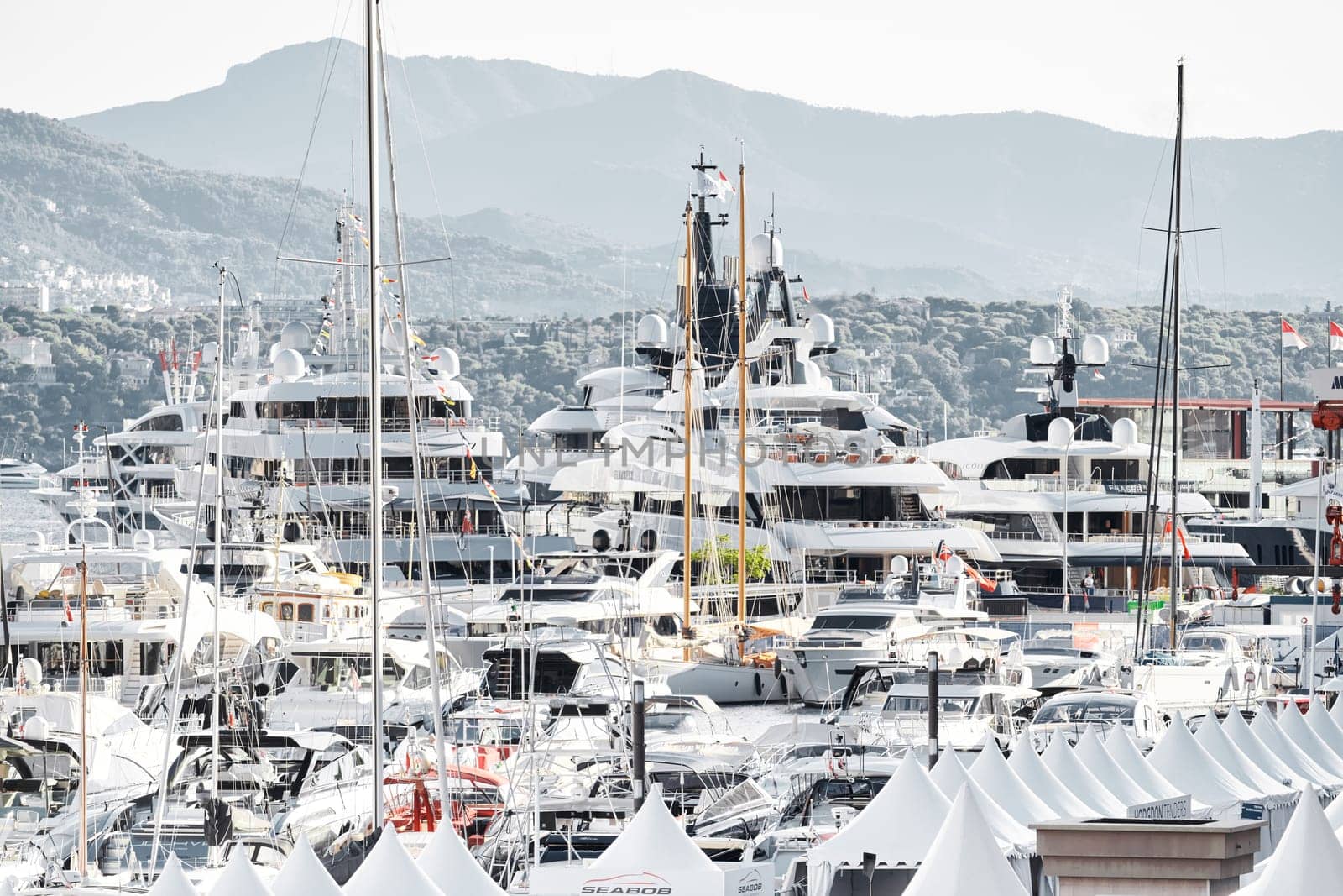 Monaco, Monte Carlo, 01 October 2022 - The famous motorboat exhibition at morning, mega yacht show, novelties of the boating industry. High quality photo