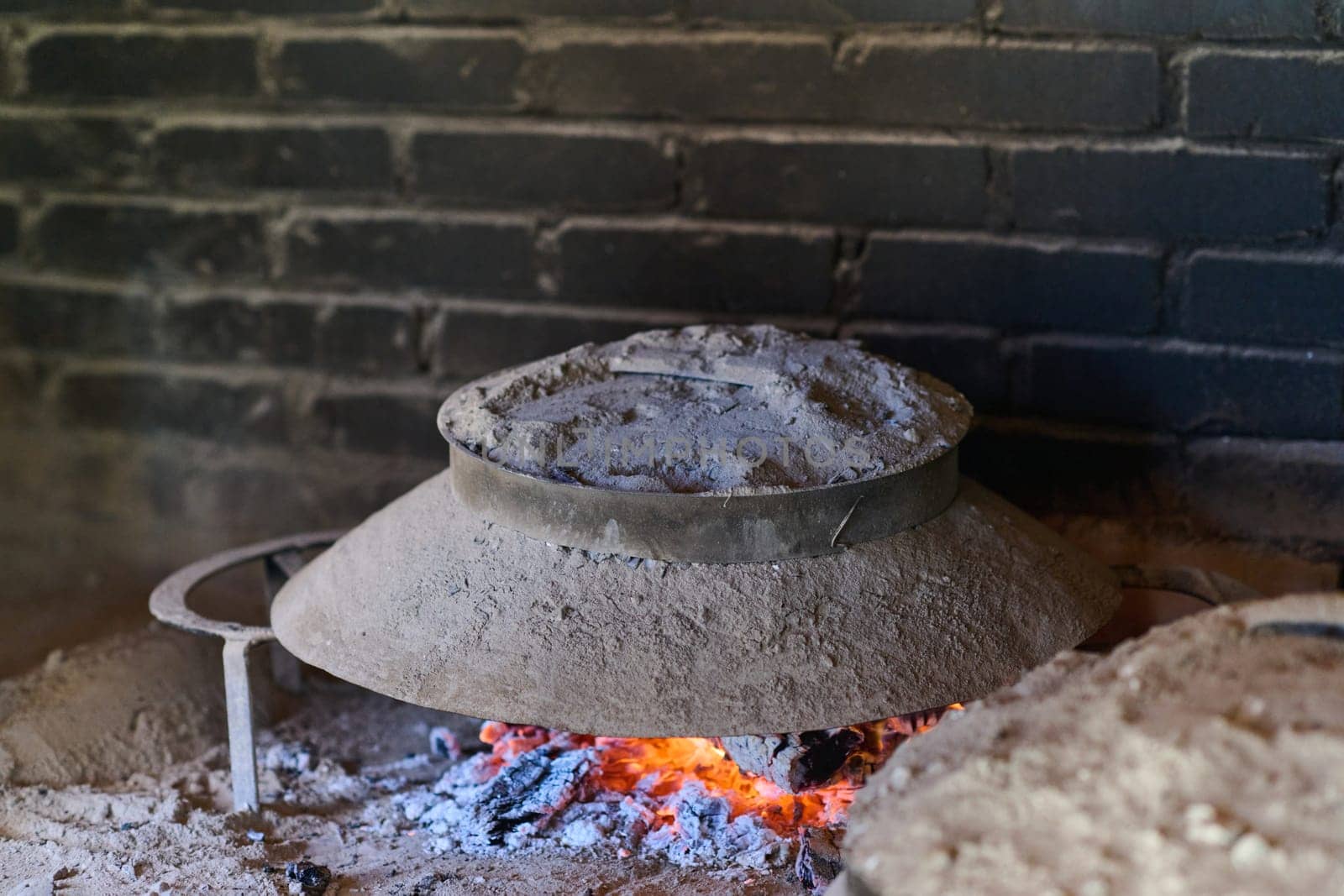 Capturing the essence of Bosnian culinary tradition, step-by-step preparation of a traditional Bosnian pie, showcasing the meticulous craftsmanship and authentic flavors involved in the culinary journey.