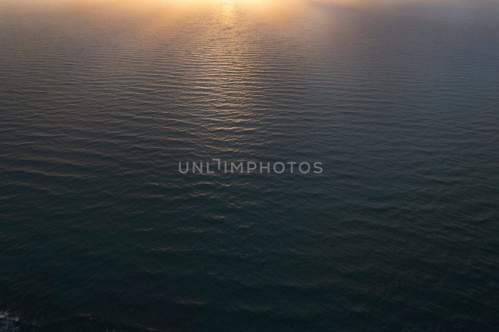 Aerial photographic documentation of a sunset over the Mediterranean sea 