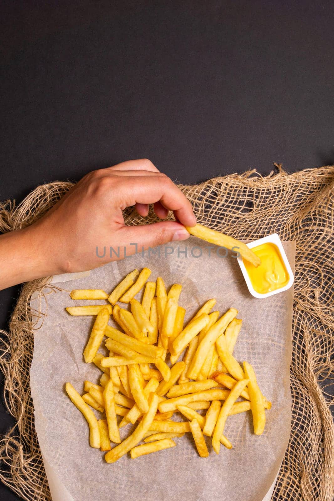 Appetizing Encounter With Golden French Fries and Creamy Mustard Sauce