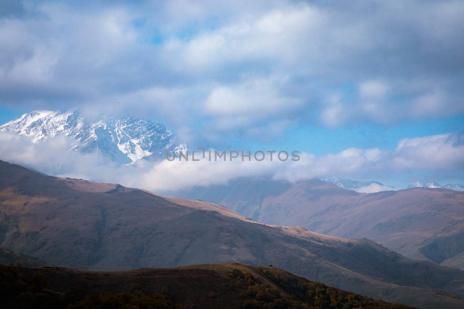 A majestic landscape with a winter snow-capped mountain, delighting with its beauty and silence