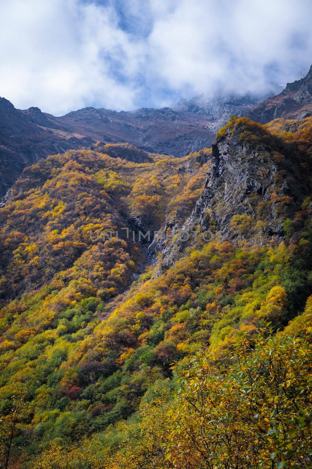 Colorful autumn transforms the mountain world, creating breathtaking landscapes