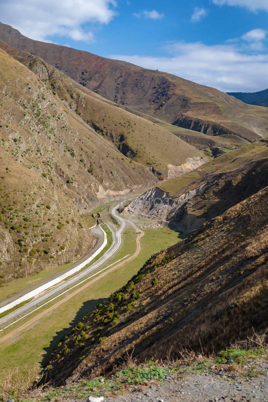 Winding roads among the mountains, view from above, captivating landscape