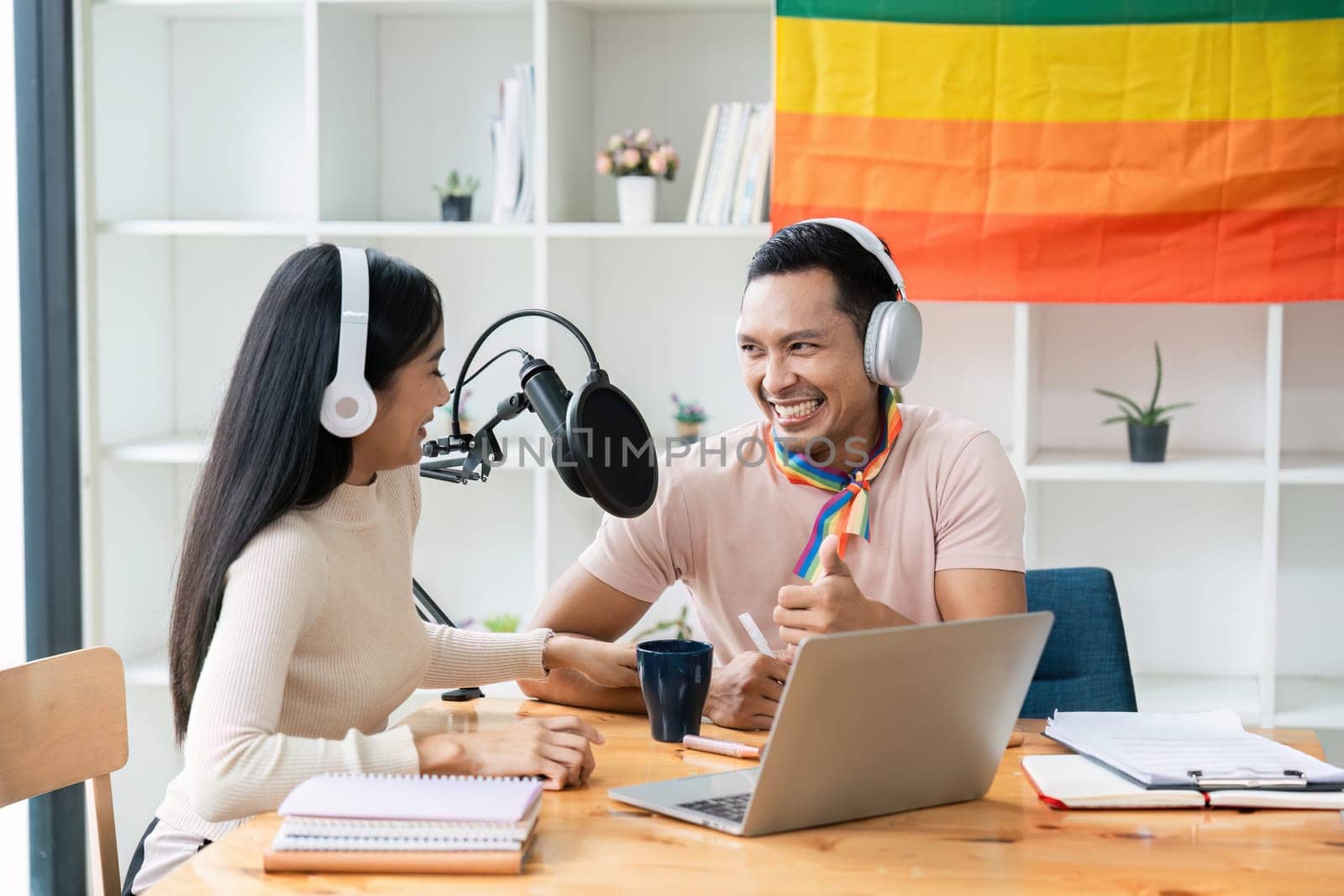 Podcaster is interviewing a guest about the content topic of LGBTQIA. Podcast concept.