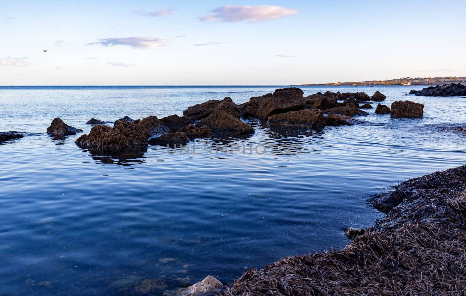 Seascape with rocks near the beach by EdVal