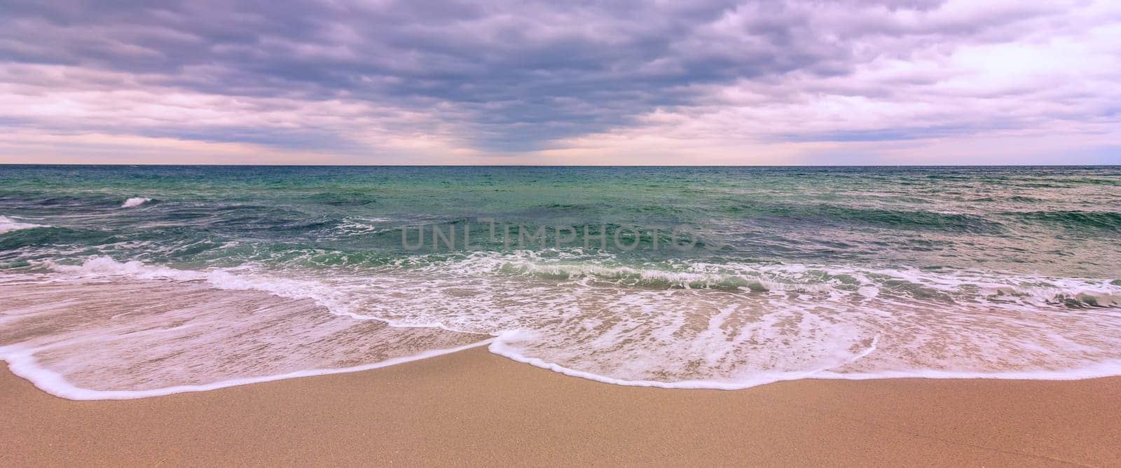 Beautiful pastel panoramic view of the sea. Wave pattern