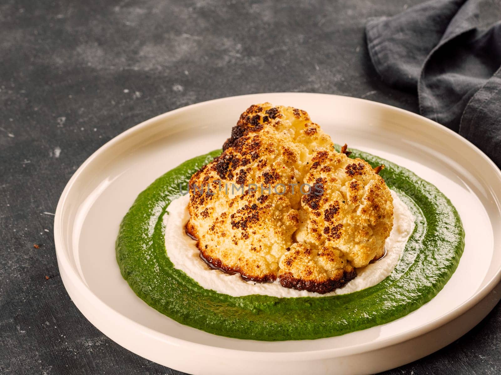 Vegetarian cauliflower steak. Grilled cauliflower by fascinadora