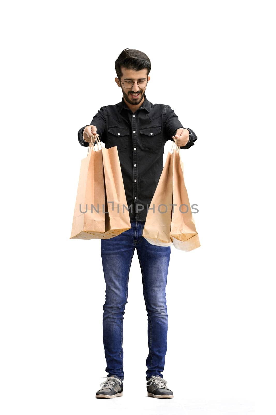 Man, on a white background, full-length, with bags.