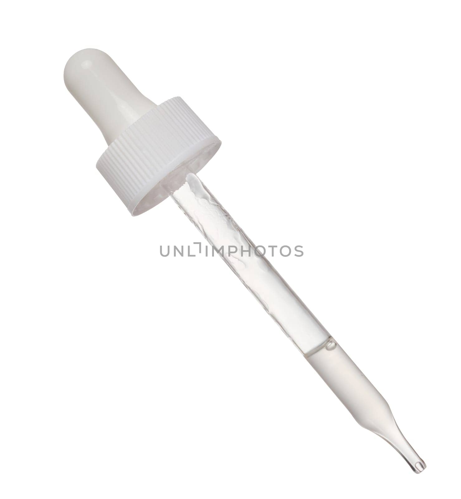 Transparent glass pipette with white liquid on isolated background by ndanko