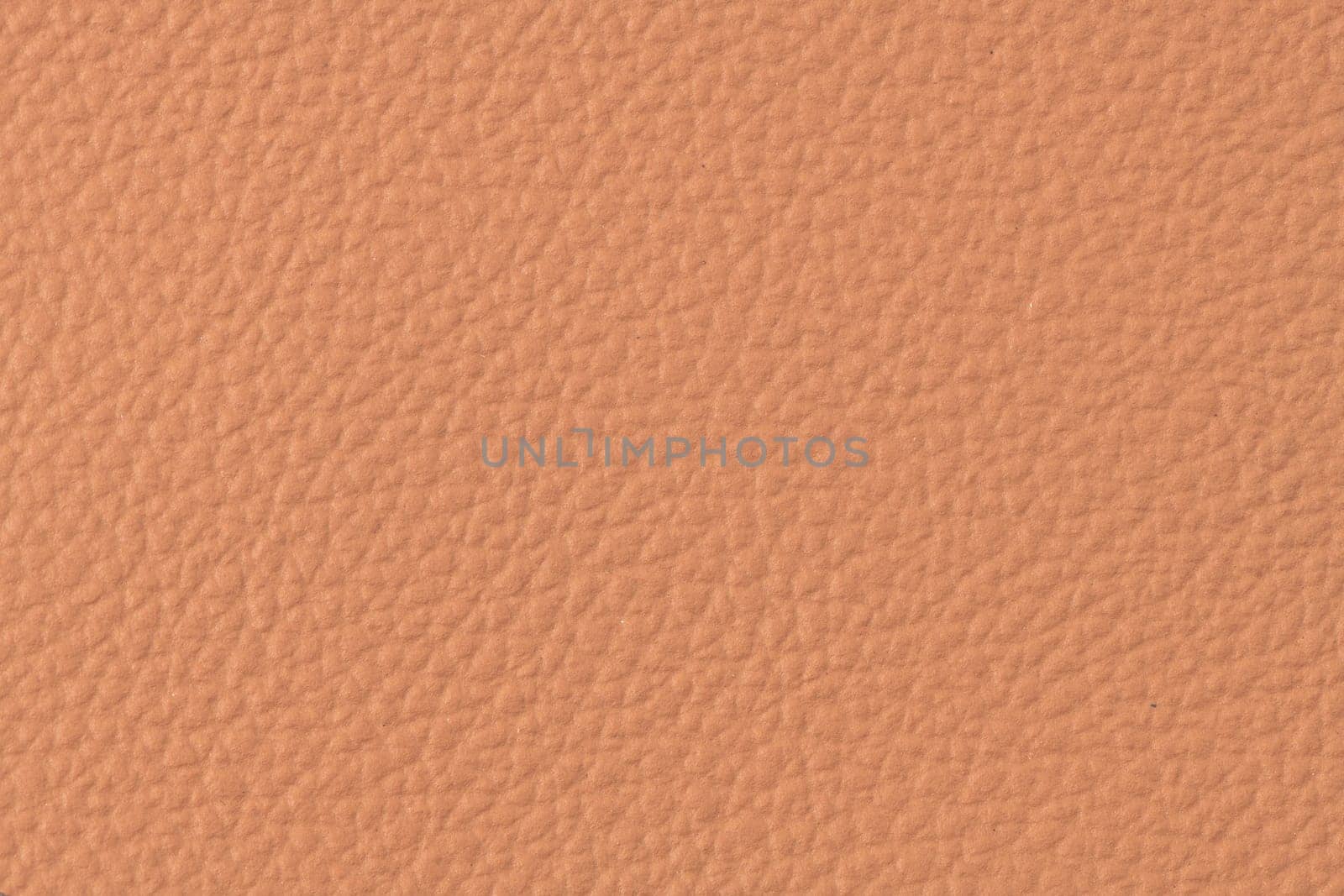 Closeup of detailed brown leather texture background.