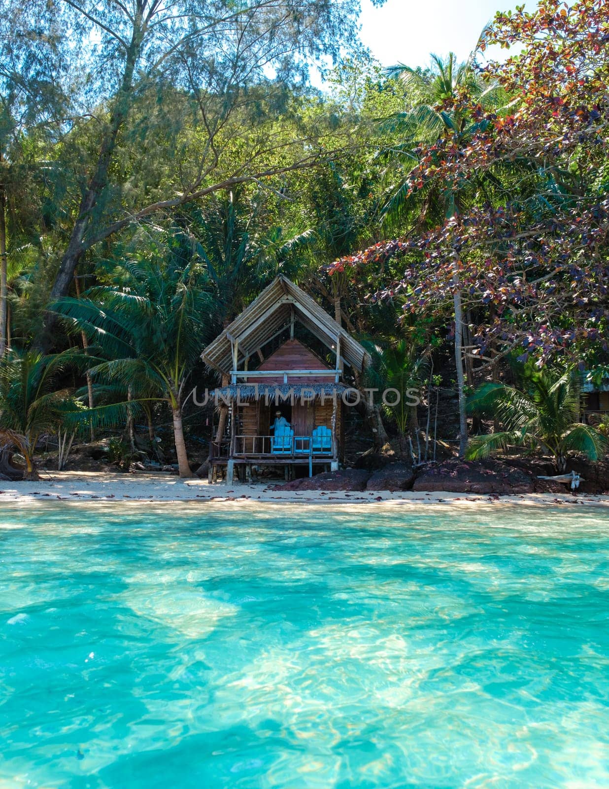 Koh Wai Island Trat Thailand is a tinny tropical Island near Koh Chang. wooden bamboo hut bungalow on the beach on a sunny day