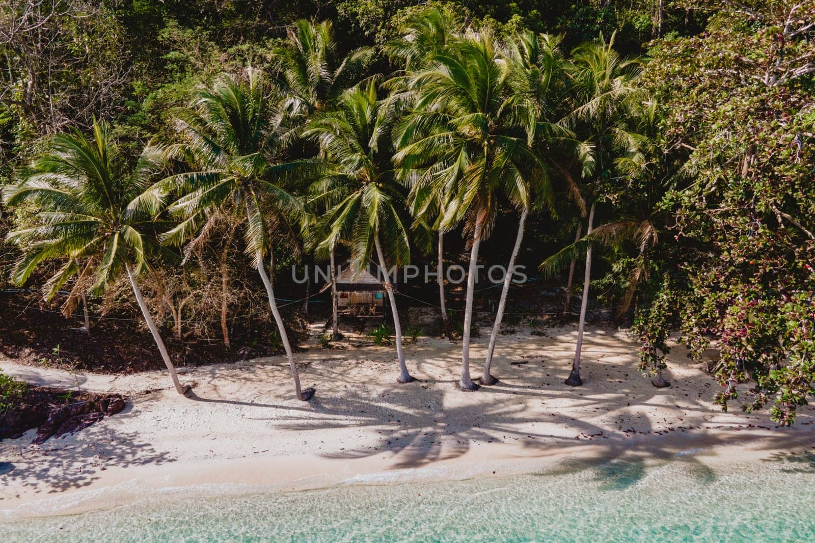 Koh Wai Island Trat Thailand is a tinny tropical Island near Koh Chang. wooden bamboo hut bungalow on the beach