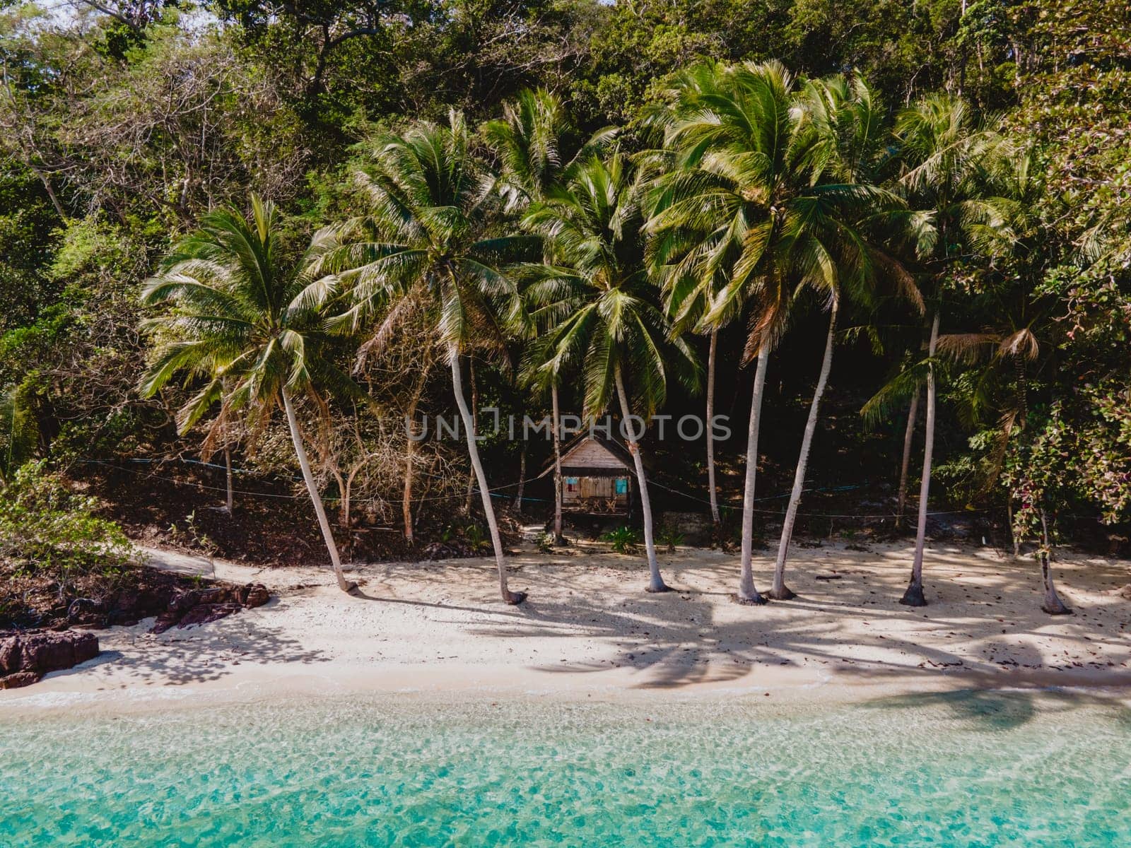 Koh Wai Island Trat Thailand is a tinny tropical Island near Koh Chang. wooden bamboo hut bungalow on the beach