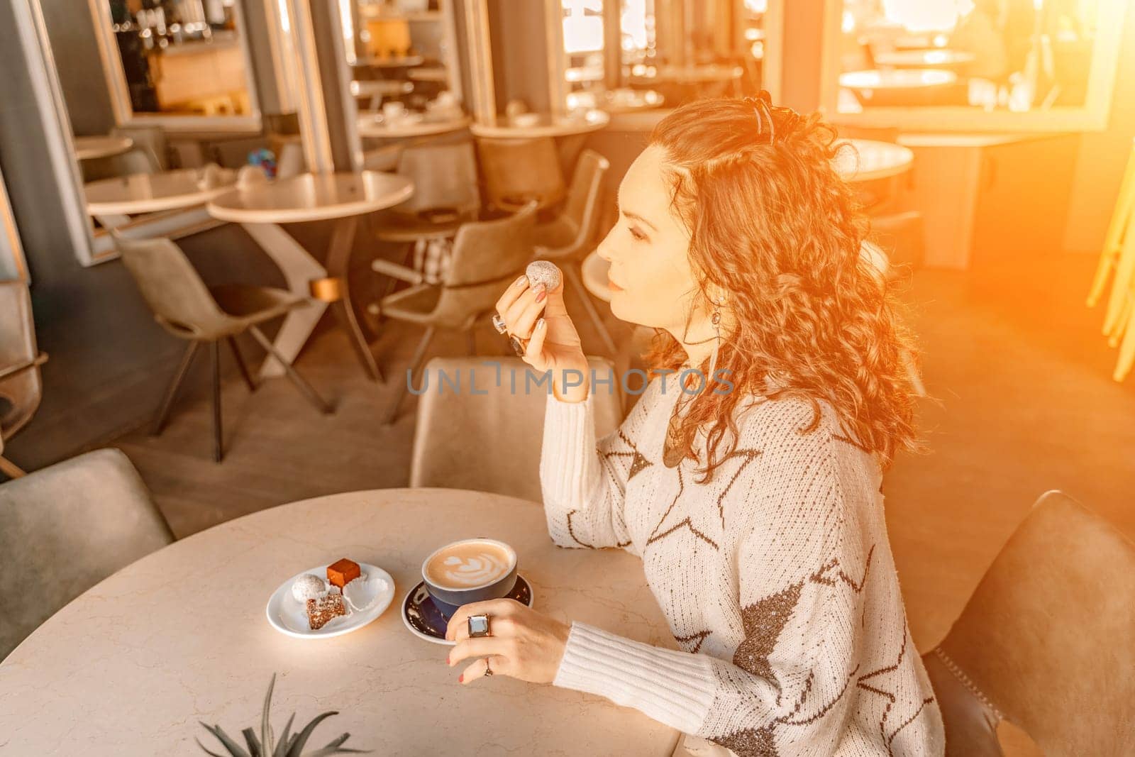 Woman cafe coffee breakfast. Portrait of an adult beautiful woman in an elegant suit in a cafe.