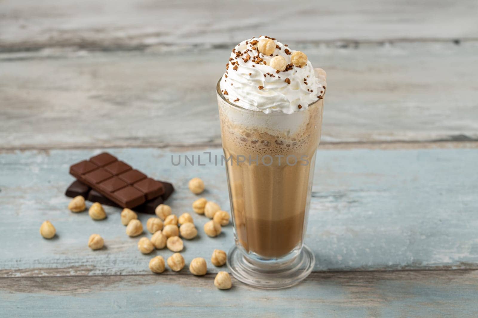 hazelnut and chocolate milkshake with coffee sprinkled on top