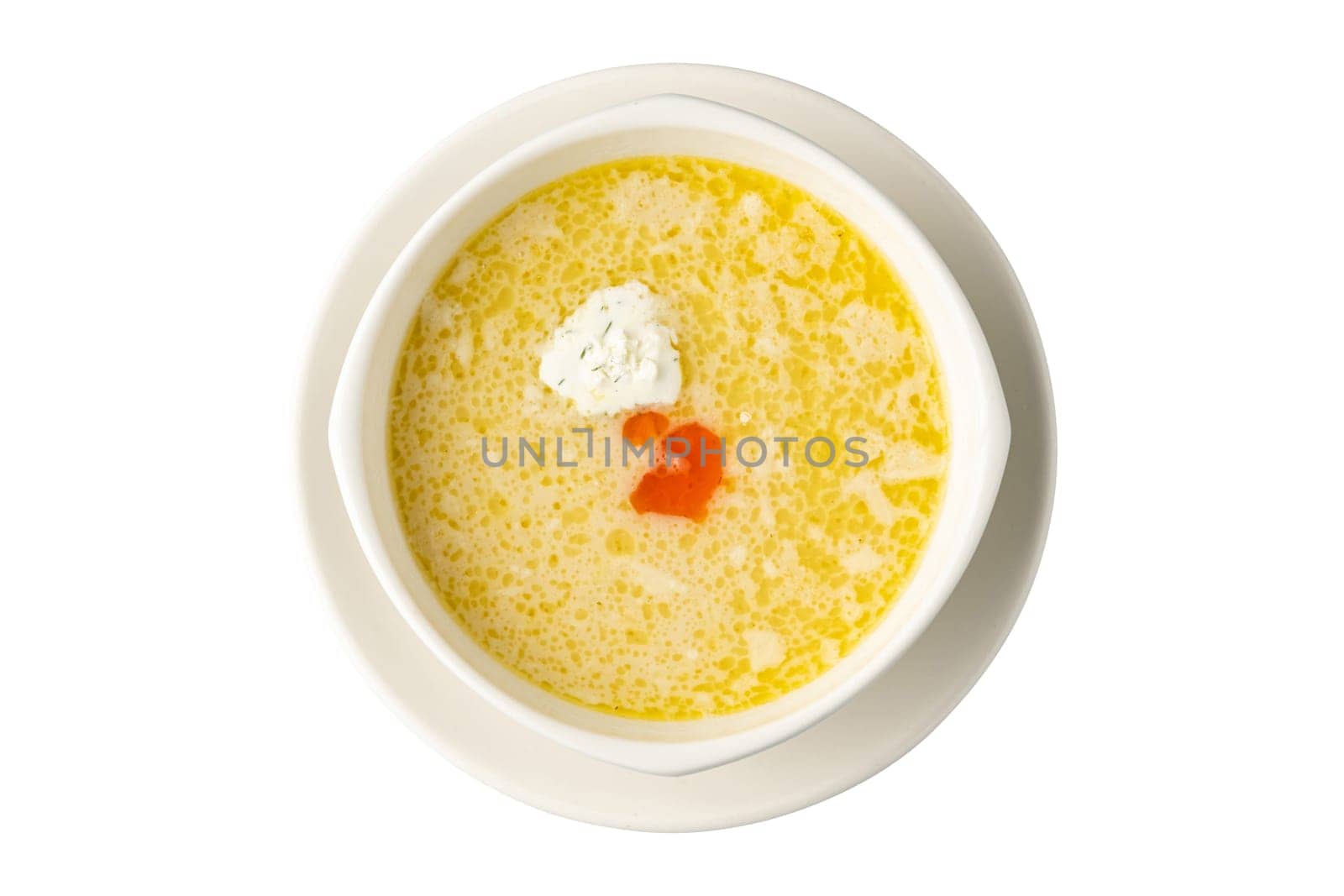 Seasoned fish soup on a white porcelain plate by Sonat