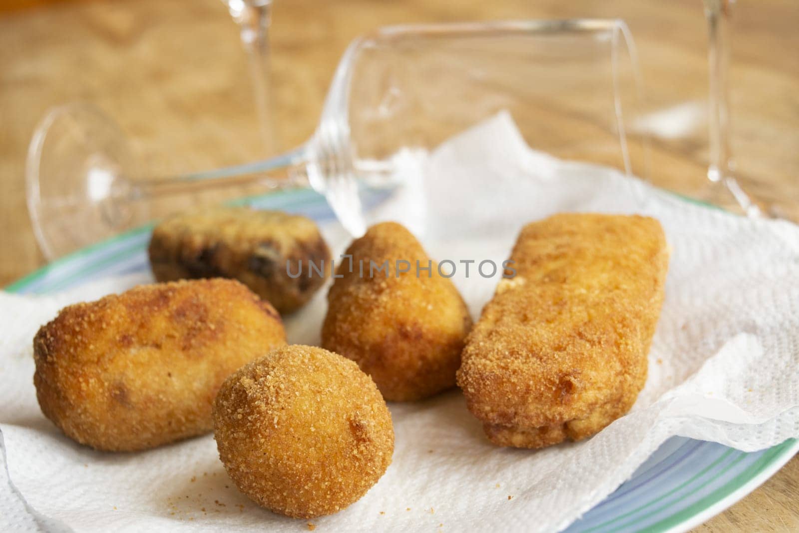 mixed fried food: potato croquettes, supplì, ricotta and aubergine meatballs mozzarella in carrozz