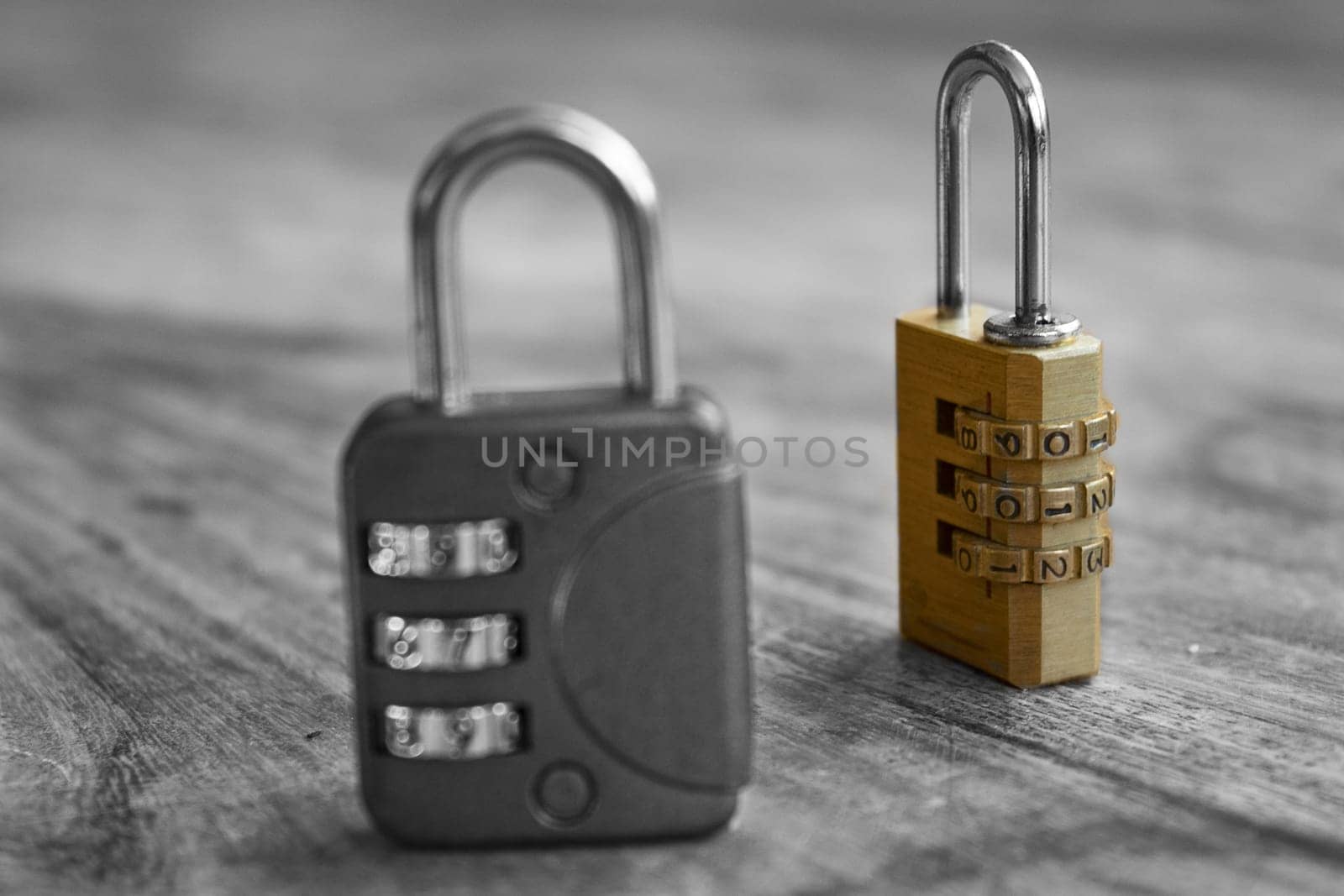 concept of safety  with two combination lock in black and white and white and color
