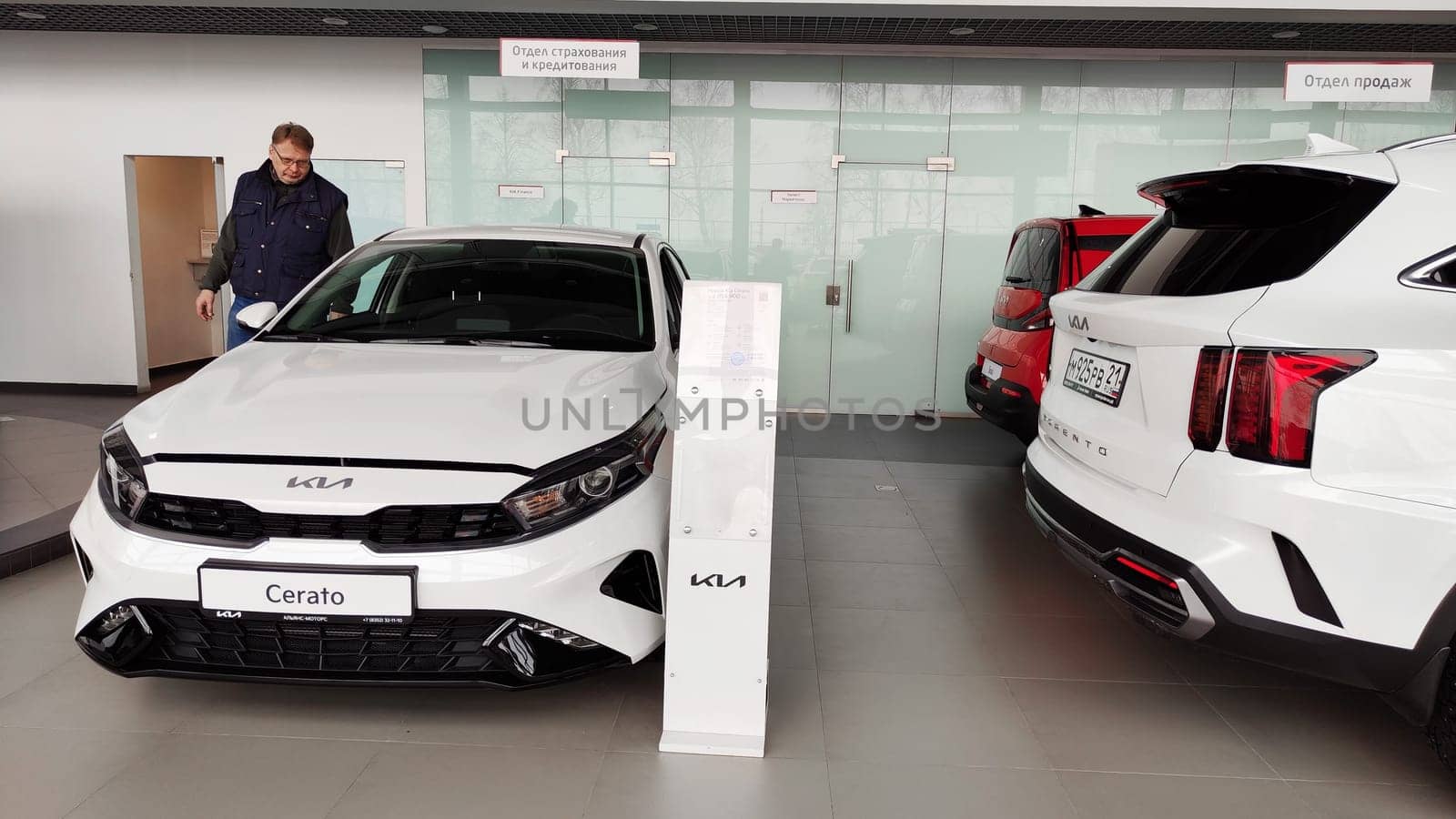 Cheboksary, Russia - March 20, 2023: Cars in showroom of dealership KIA