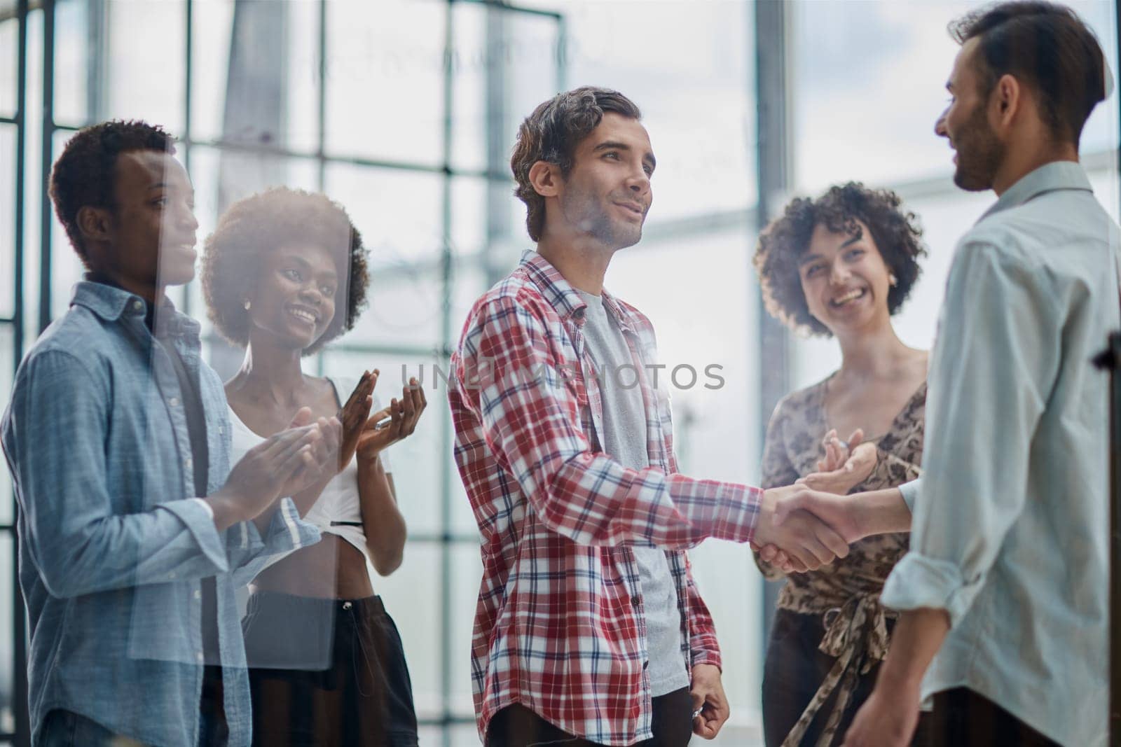 In a modern office. a diverse team of managers at a company meeting to discuss business projects.