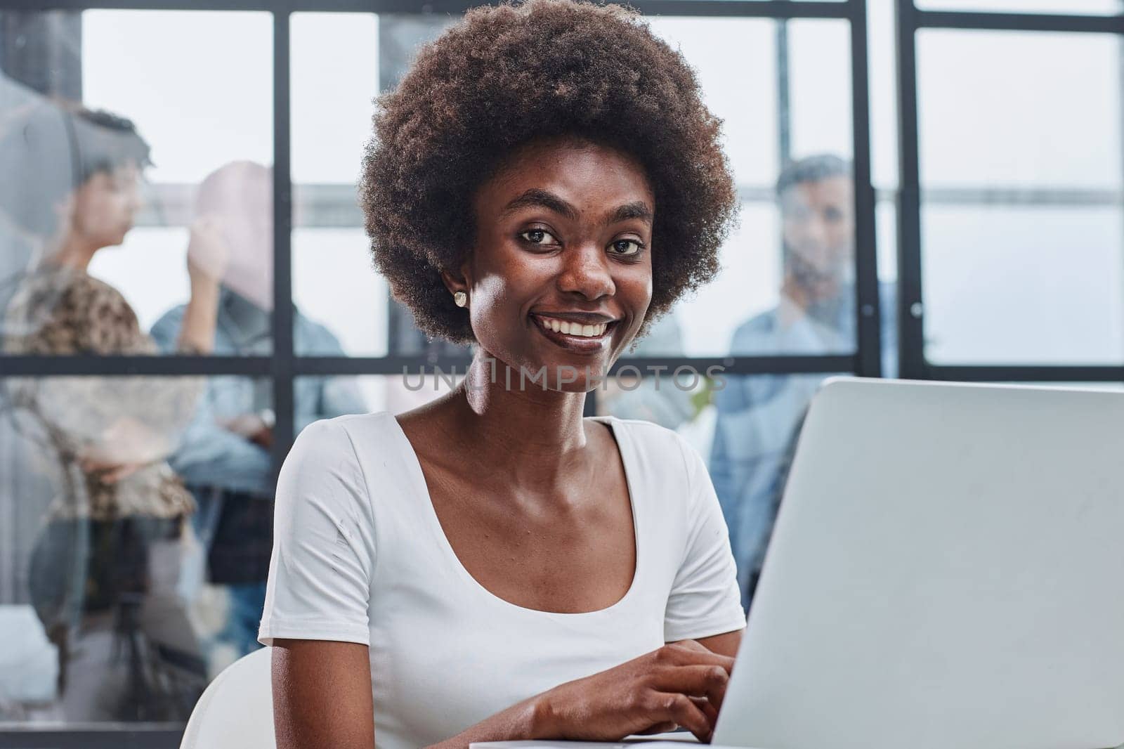 Portrait of a young business woman in an modern office