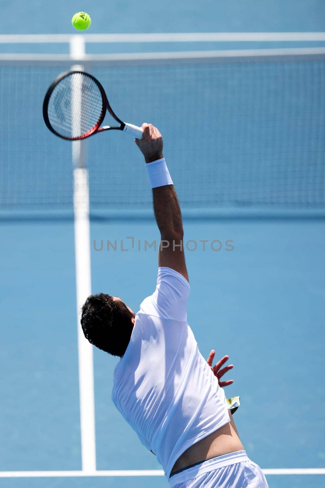 MELBOURNE, AUSTRALIA - JANUARY 11: Marin Cilic of Croatia serves to Sir Andy Murray of Great Britian during day one of the 2024 Kooyong Classic at Kooyong on January 11, 2024 in Melbourne, Australia.