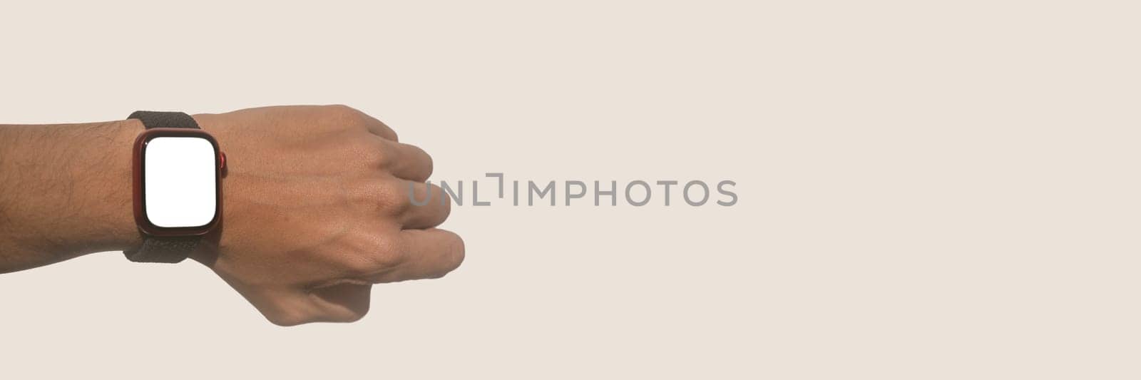 Black male hand wearing smart watch on beige banner. Mockup. High quality photo