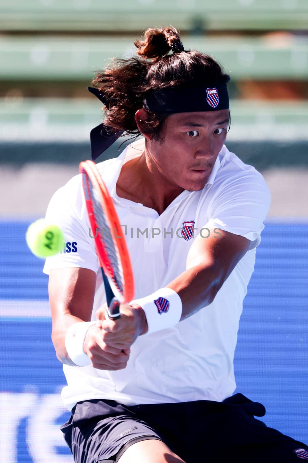 MELBOURNE, AUSTRALIA - JANUARY 11: Zhang Zhi Zhen of China whilst playing against Frances Tiafoe of USA during day one of the 2024 Kooyong Classic at Kooyong on January 11, 2024 in Melbourne, Australia.
