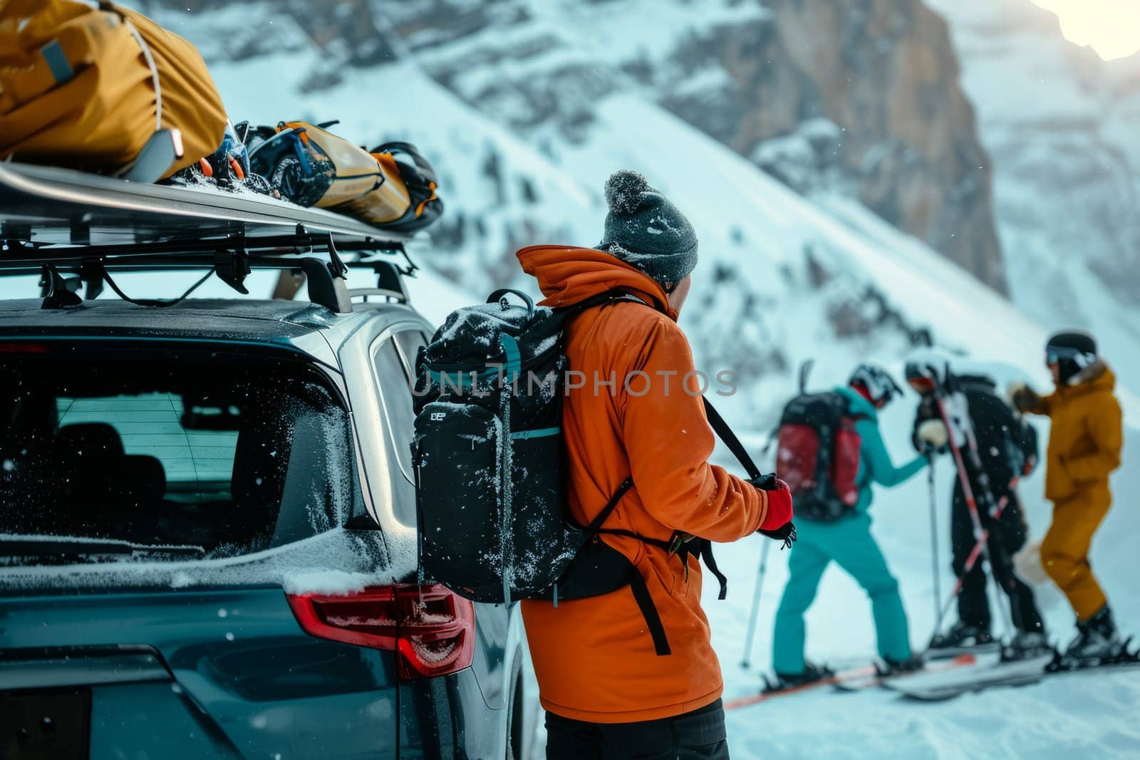 Tourists outdoor with equipment from the car skis and snowboards, winter activities concept