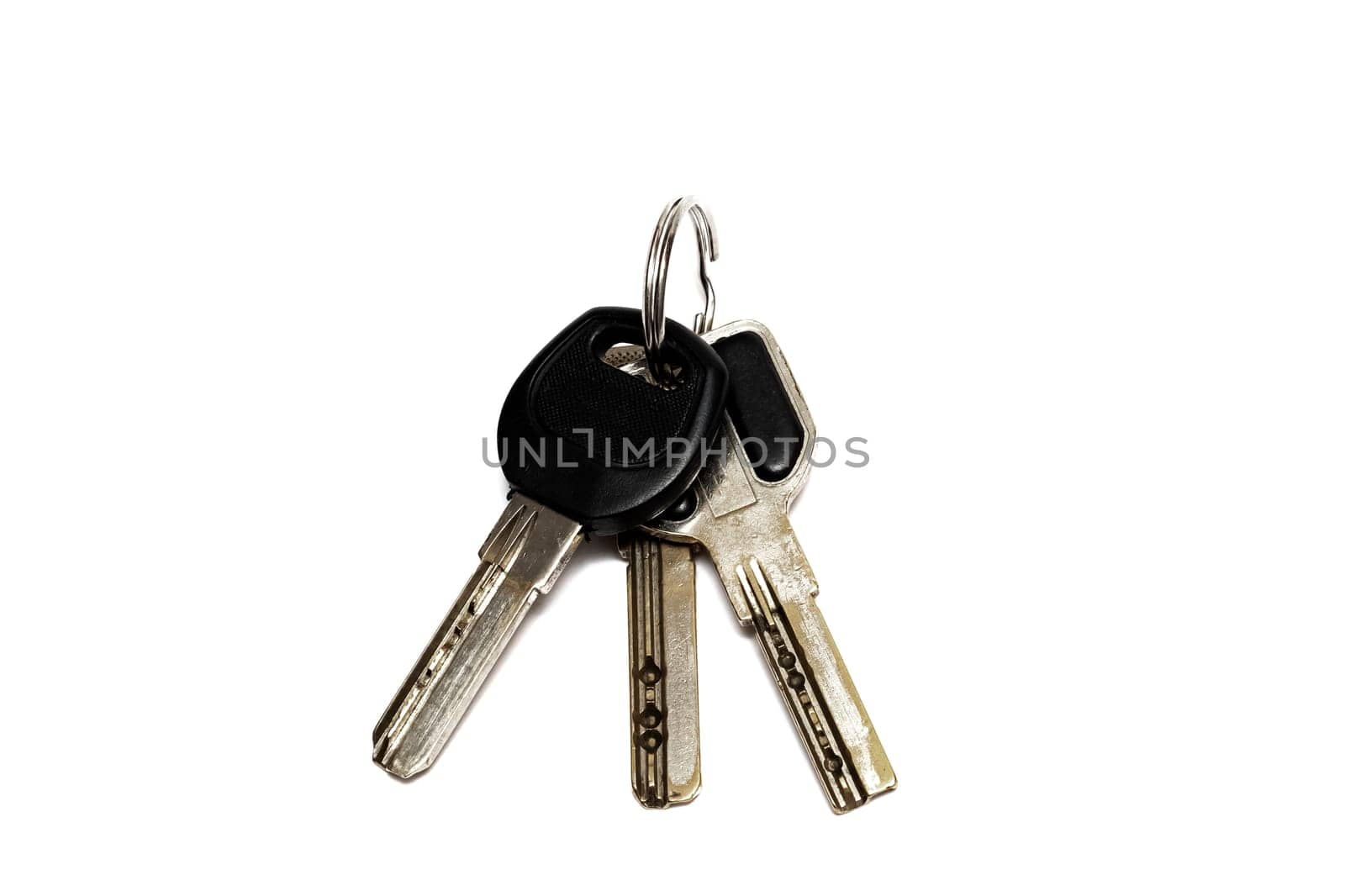 A bunch of keys isolated on white background close up