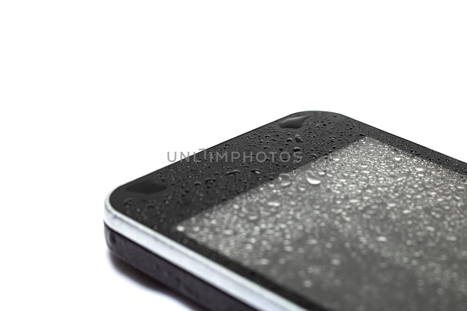 Drops of water on a phone display isolated on a white background
