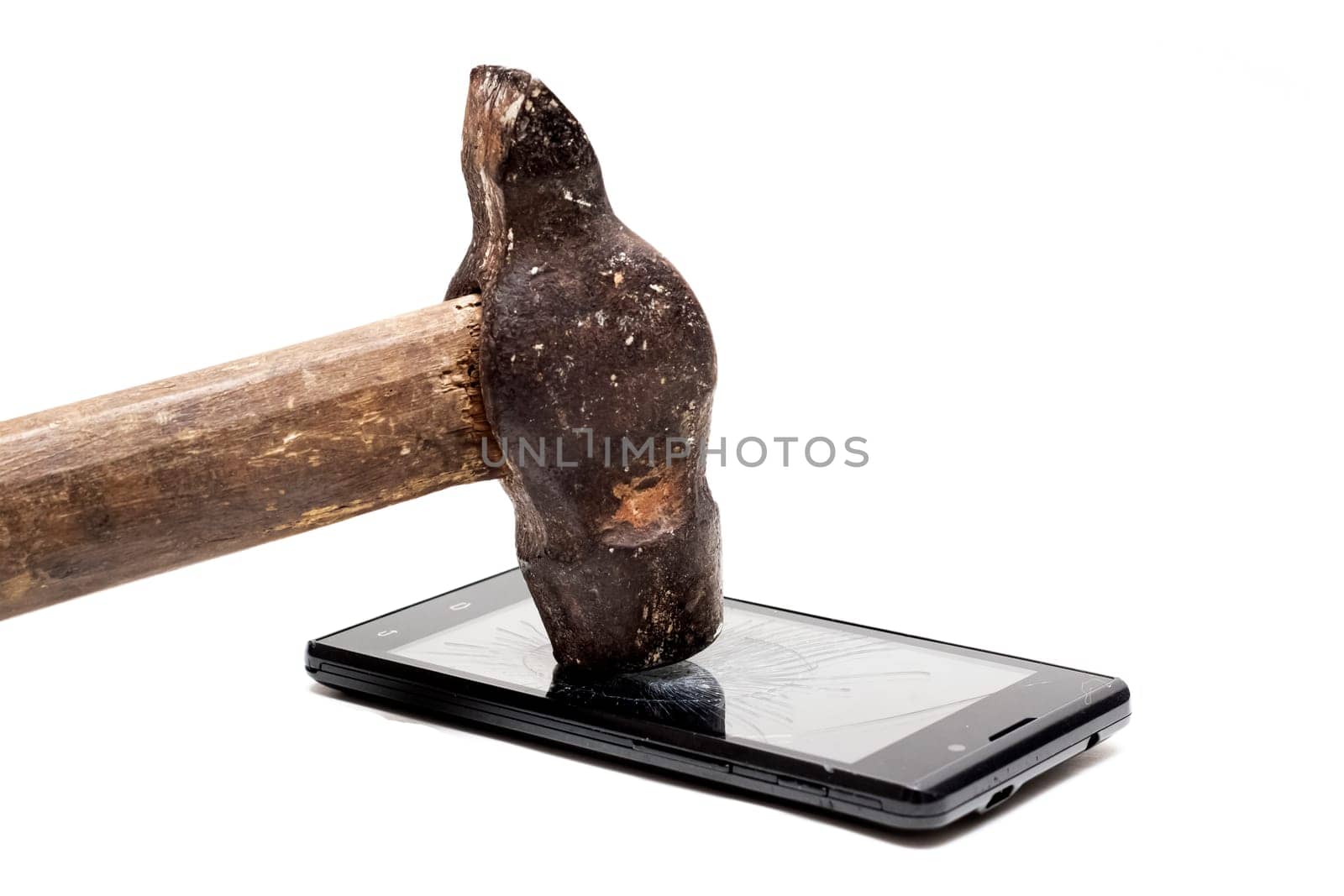 Phone under the hammer isolated on a white background