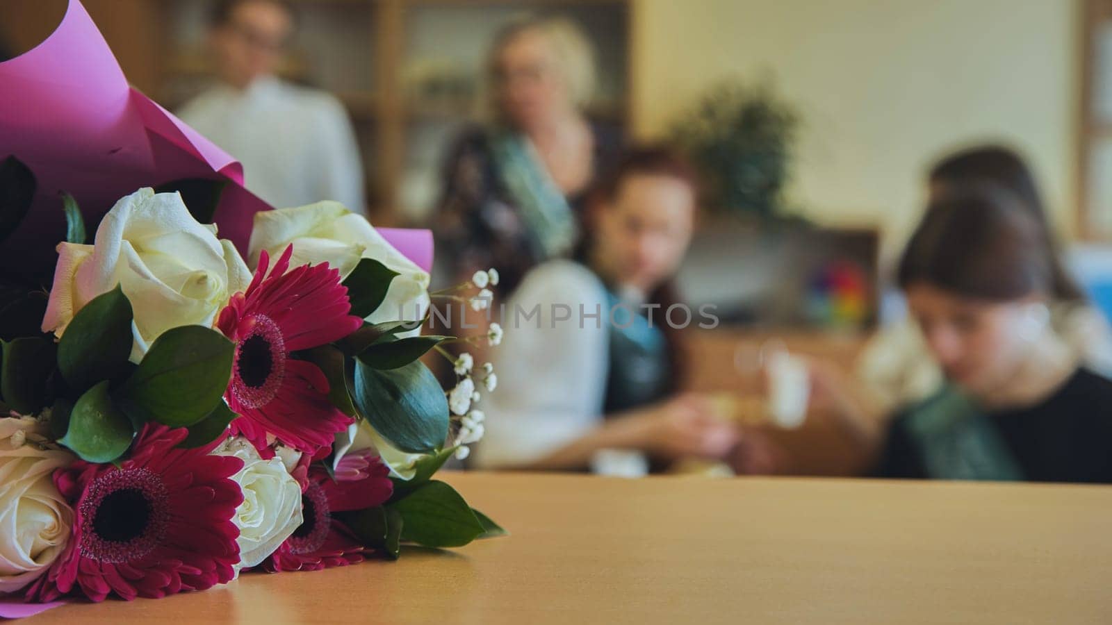 First day of school. Flowers lie on the table to celebrate the day of school. by DovidPro