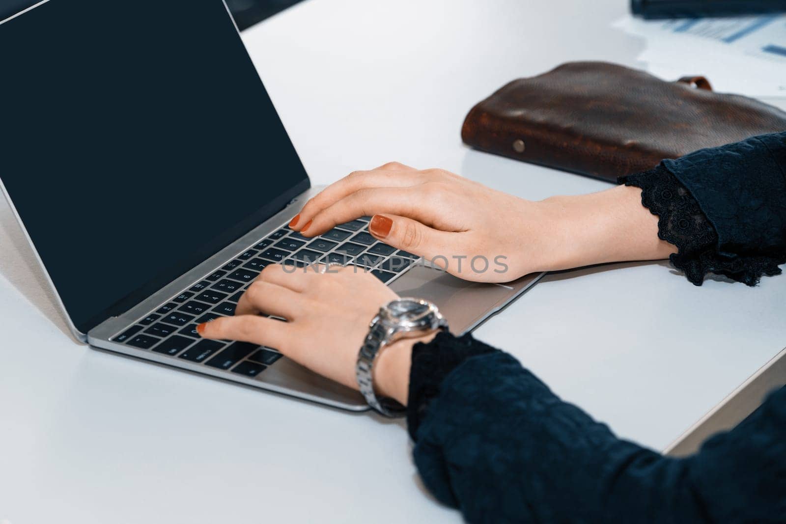 Business woman using computer in office. uds by biancoblue